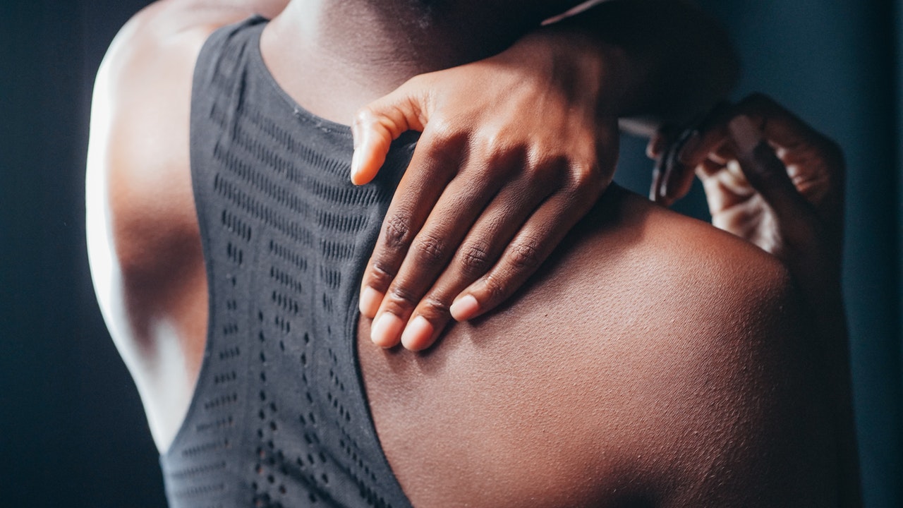 young african women having back pain